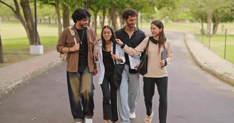 Commerce students walking together on campus