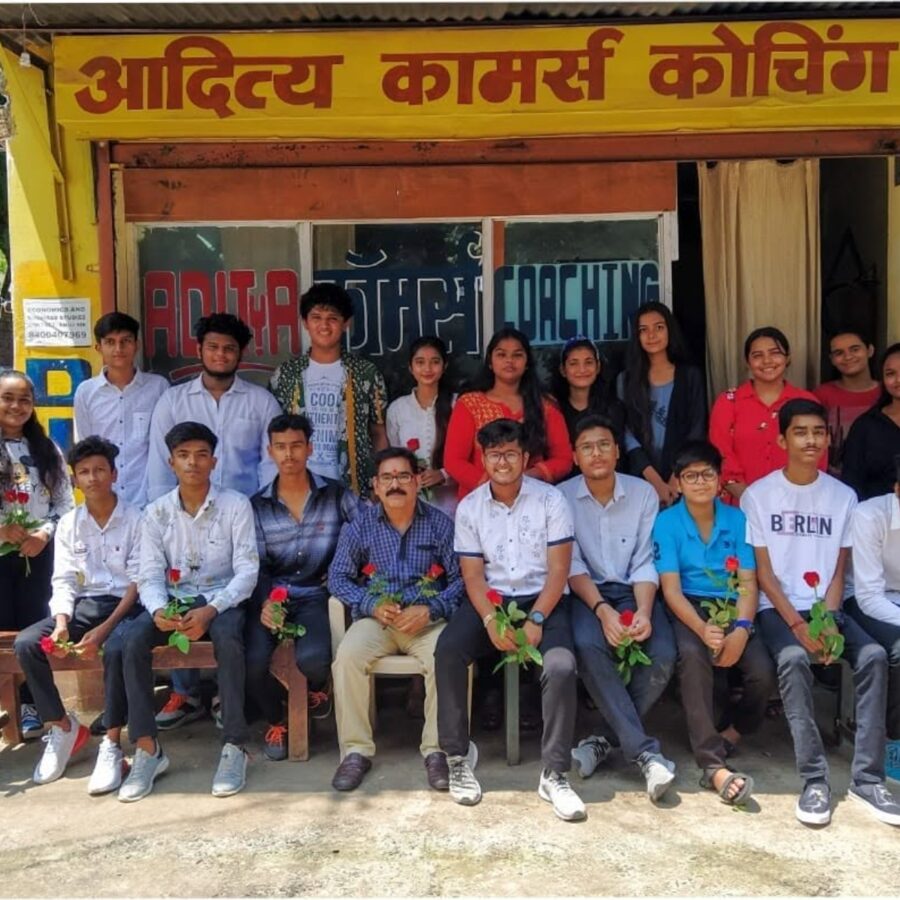 Banta Sir with his students outside Aditya Commerce Coaching in Ranjhi